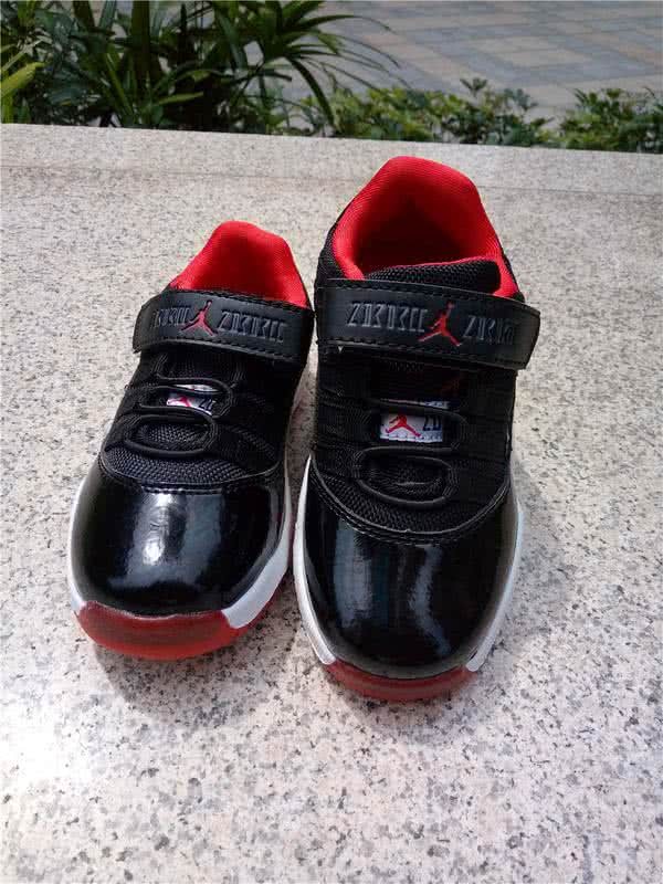 Air Jordan 11 Kids Black And Red 4