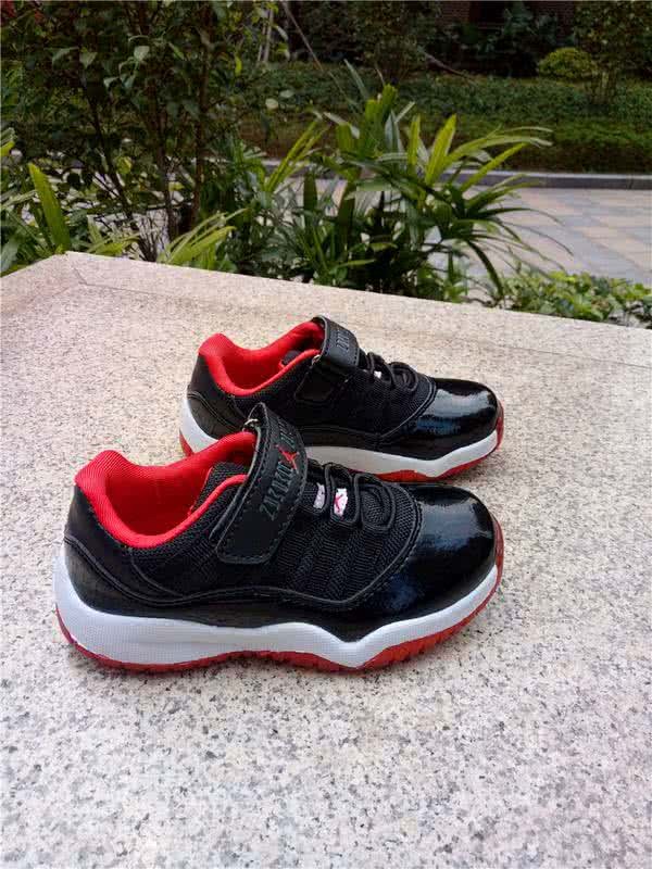 Air Jordan 11 Kids Black And Red 7