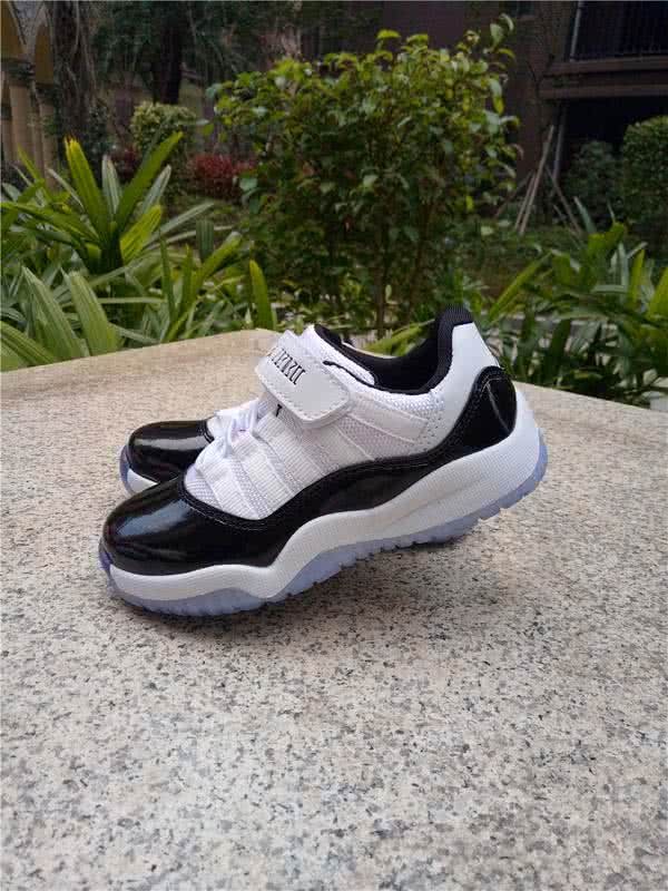 Air Jordan 11 Kids Black And White 5