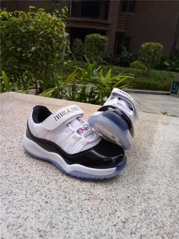 Air Jordan 11 Kids Black And White 8