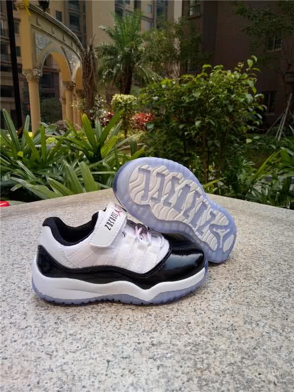 Air Jordan 11 Kids Black And White 1