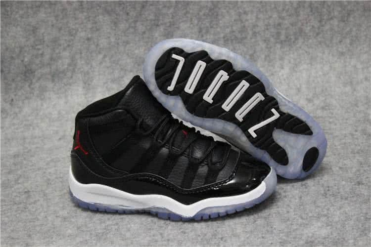 Air Jordan 11 Kids Black Upper White Sole Red Logo 1