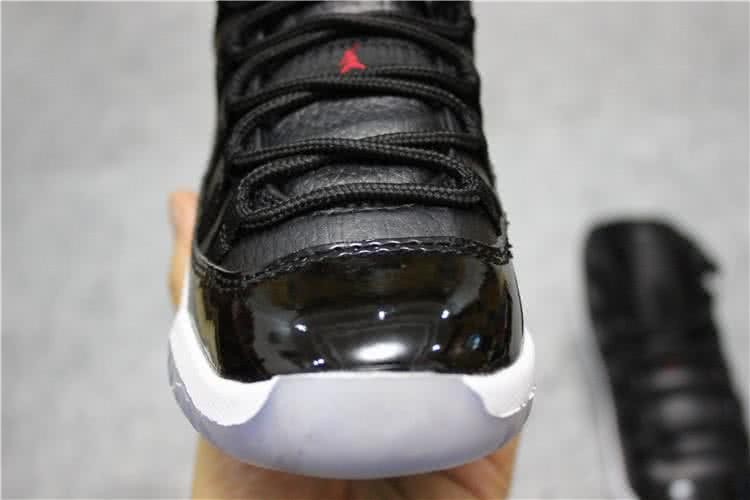 Air Jordan 11 Kids Black Upper White Sole Red Logo 7